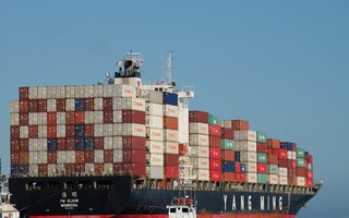 Yang Ming cargo ship with container load
