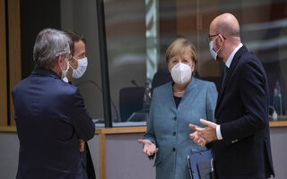 Sassoli, Merkel, Macron and Michel in discussion, all wearing face masks