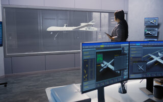 Engineers check aerodynamics of new development drone in laboratory for modern modifications using wind tunnel with steam