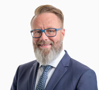Wirtschaftsminister Claus Ruhe Madsen