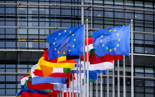 Flags in front of European Union building