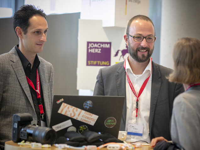 Attendees in discussion 