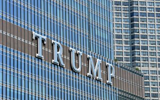 Letters "Trump" on a building front