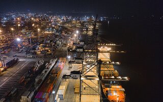 Cargo ship in port at night