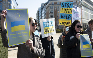 People demonstrating against war in the Ukraine