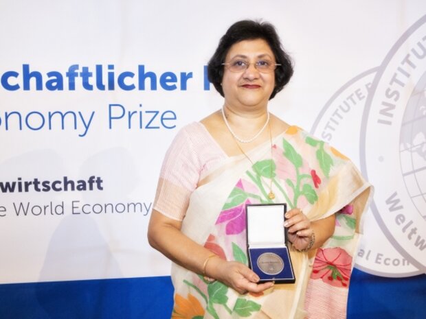 Arundhati Battacharya shows the medal she received when accepting the Global Economy Prize in 2017.