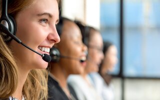 Woman customer service agents working in call center