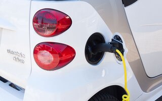 Electric Smart car getting charged
