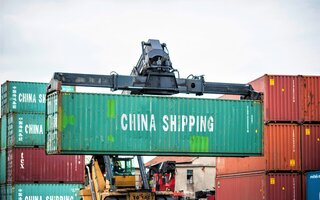 China Shipping container transported in harbor